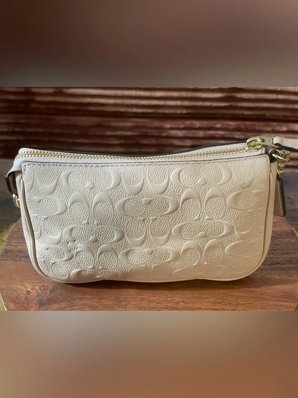 COACH Ivory Embossed Signature C Pebble Leather Large Wristlet F67567